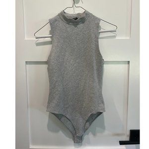 Sleeveless mock neck grey bodysuit